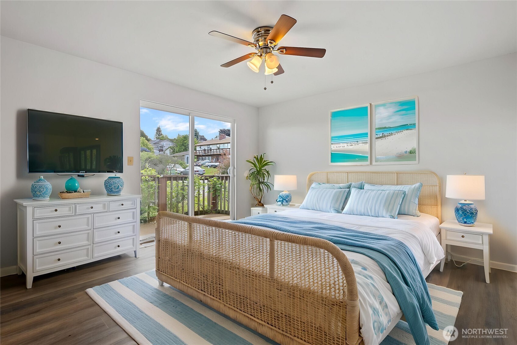 3812 R Avenue Anacortes, WA 98221 - Photo 18 of 36 a bedroom with a bed and a flat screen tv