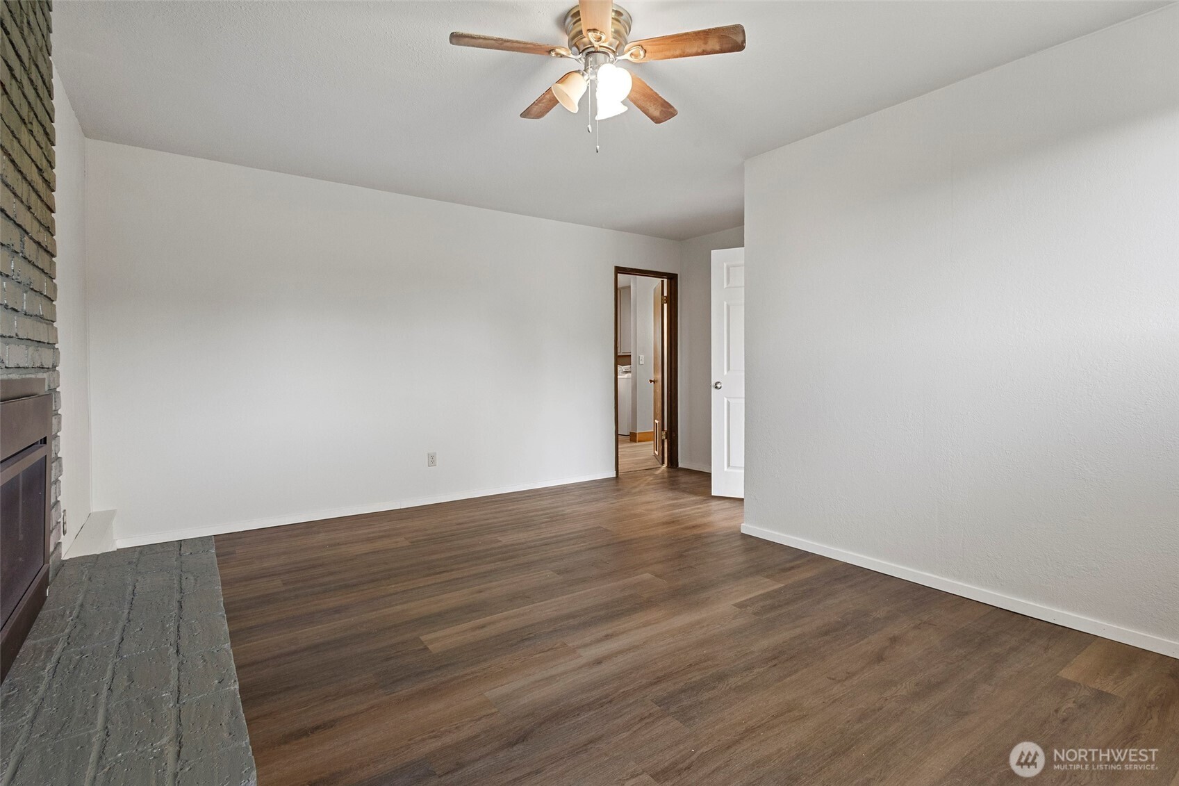 3812 R Avenue Anacortes, WA 98221 - Photo 30 of 36 wooden floor in an empty room with a window