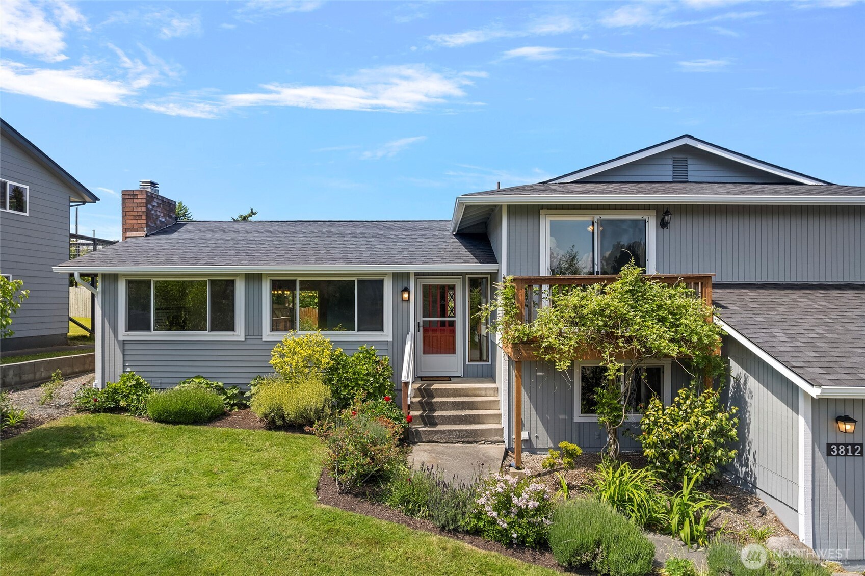 3812 R Avenue Anacortes, WA 98221 - Photo 3 of 36 front view of a house with a yard