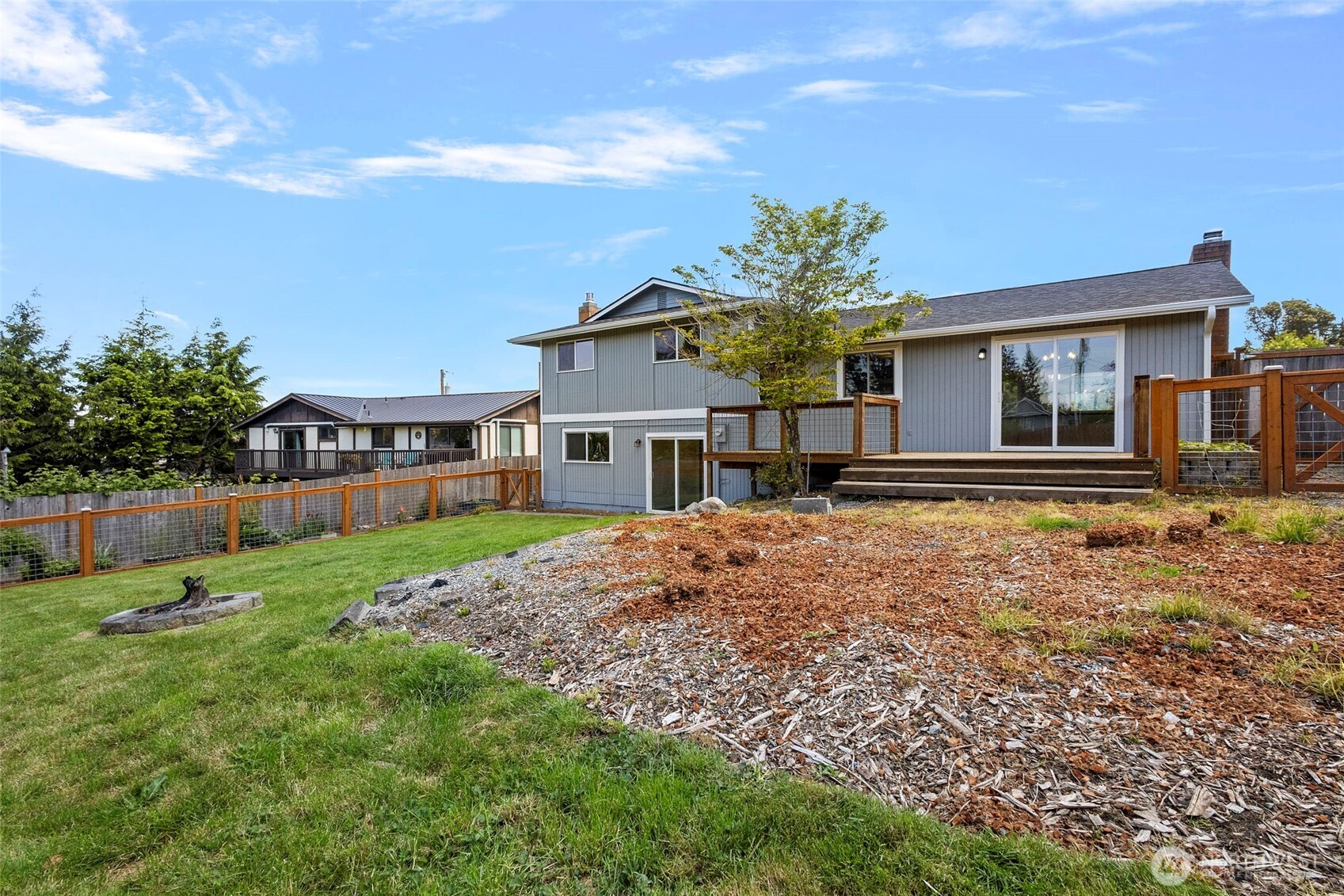 3812 R Avenue Anacortes, WA 98221 - Photo 34 of 36 a front view of a house with a yard