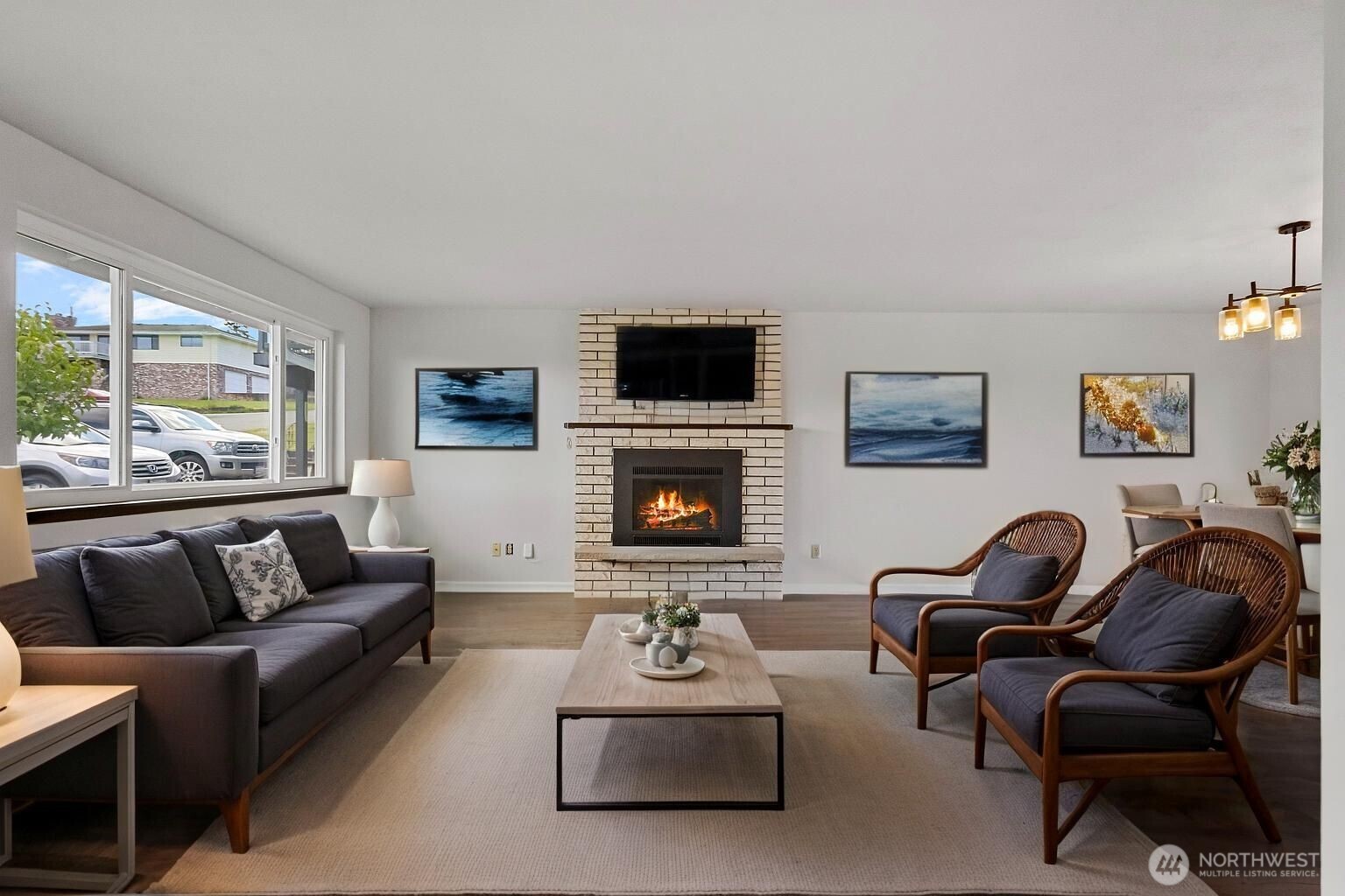 3812 R Avenue Anacortes, WA 98221 - Photo 9 of 36 a living room with furniture flat screen tv and a fireplace