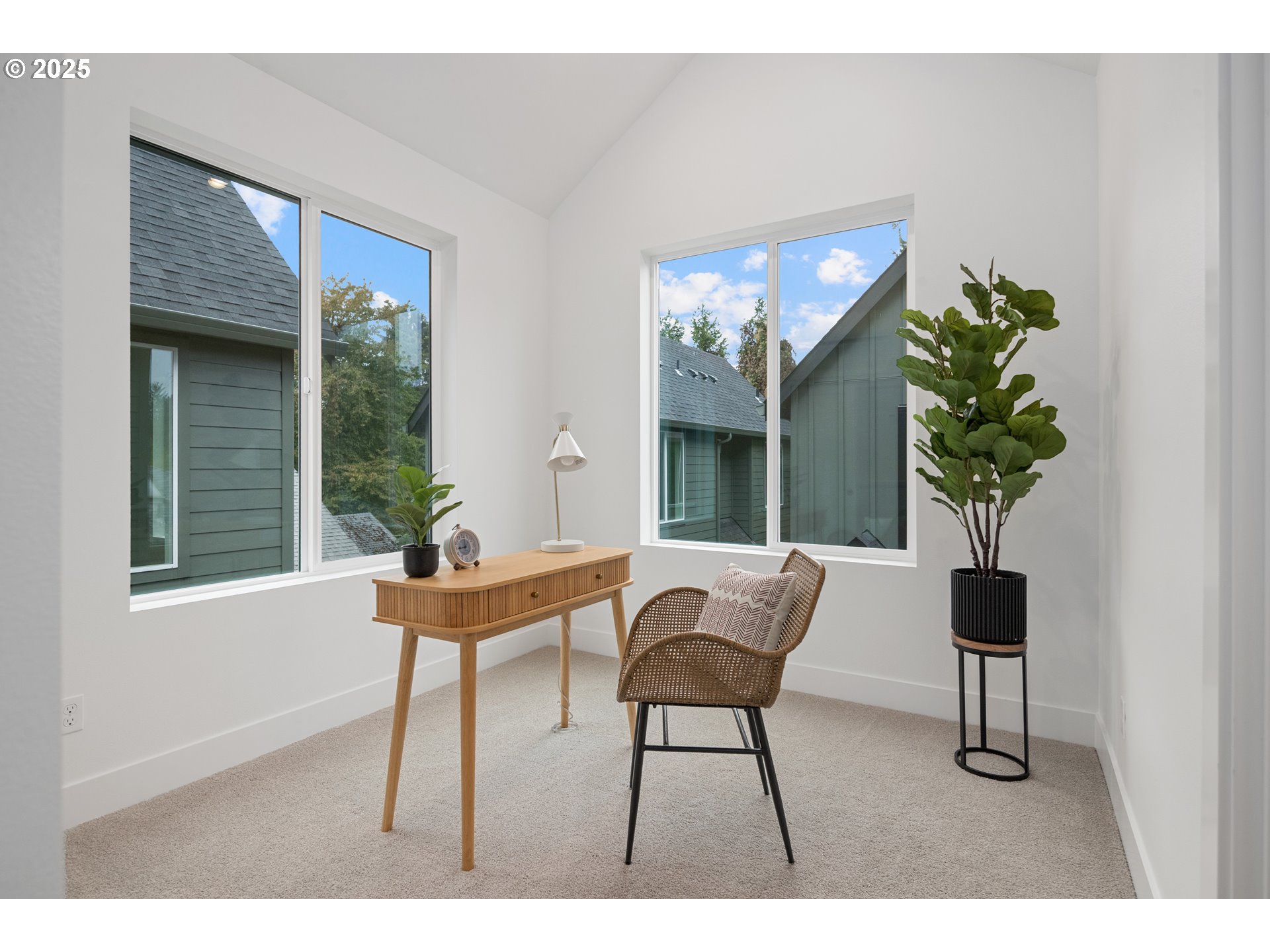 4031 Southeast Tibbetts Street Portland, OR 97202 - Photo 12 of 21 a balcony with furniture and a potted plant