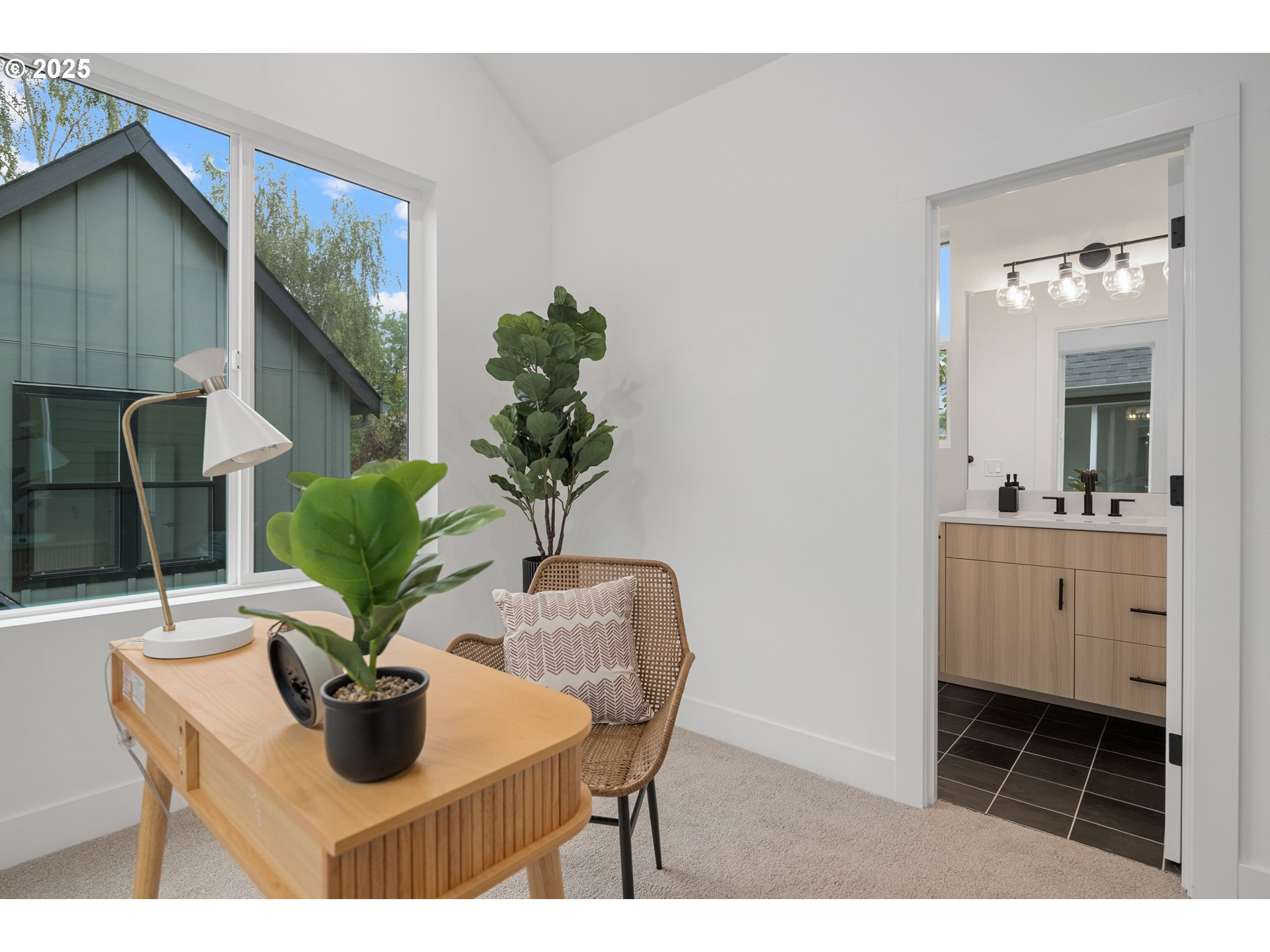 4031 Southeast Tibbetts Street Portland, OR 97202 - Photo 14 of 21 a living room with furniture and a potted plant