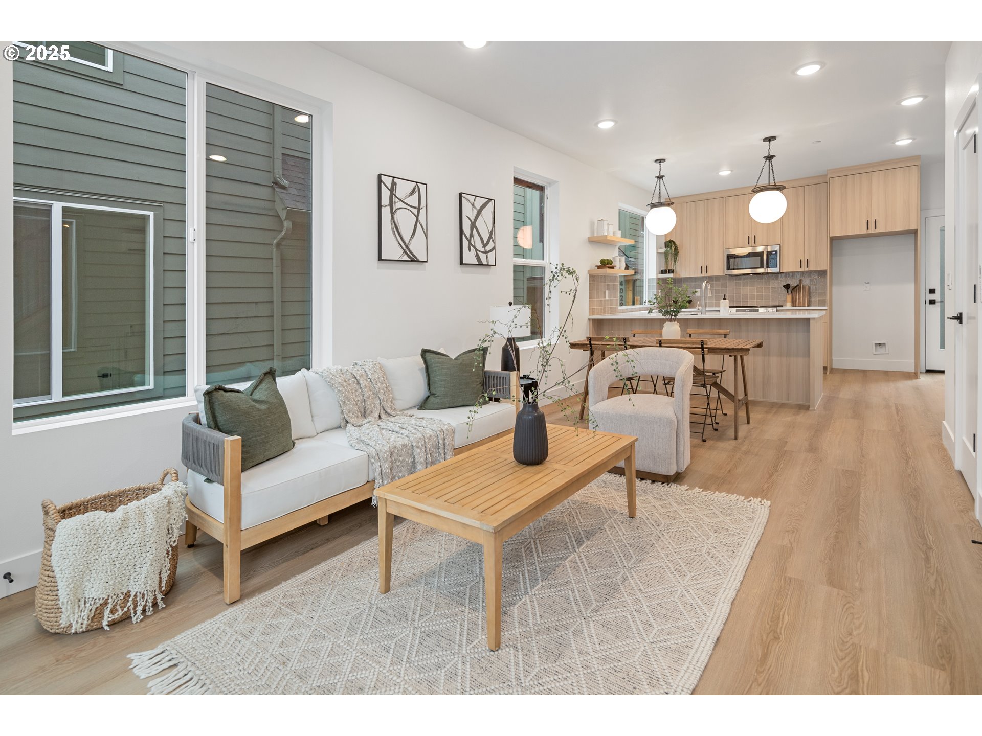 4031 Southeast Tibbetts Street Portland, OR 97202 - Photo 21 of 21 a living room with furniture and a wooden floor