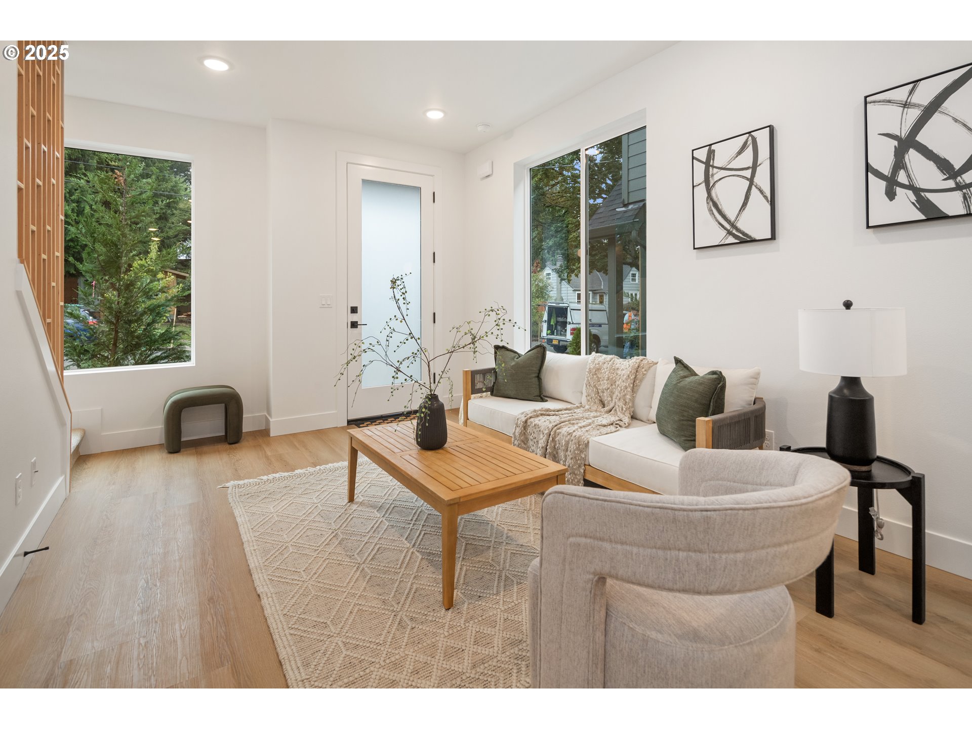 4031 Southeast Tibbetts Street Portland, OR 97202 - Photo 3 of 21 a living room with furniture and a large window