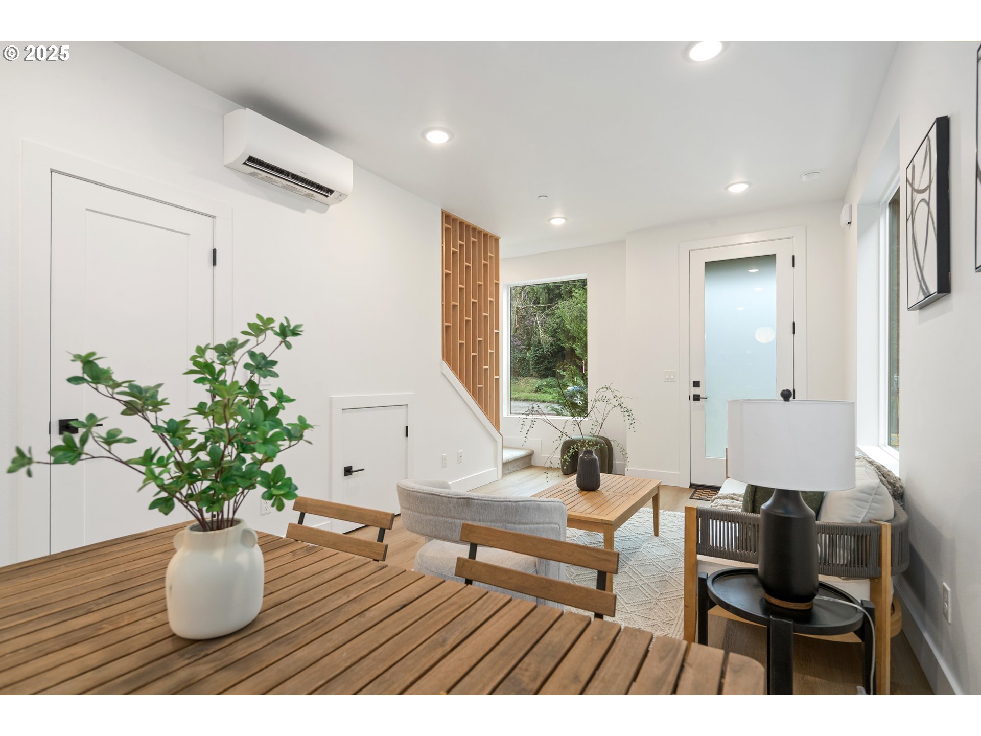 4031 Southeast Tibbetts Street Portland, OR 97202 - Photo 8 of 21 a view of living room filled with furniture and wooden floor