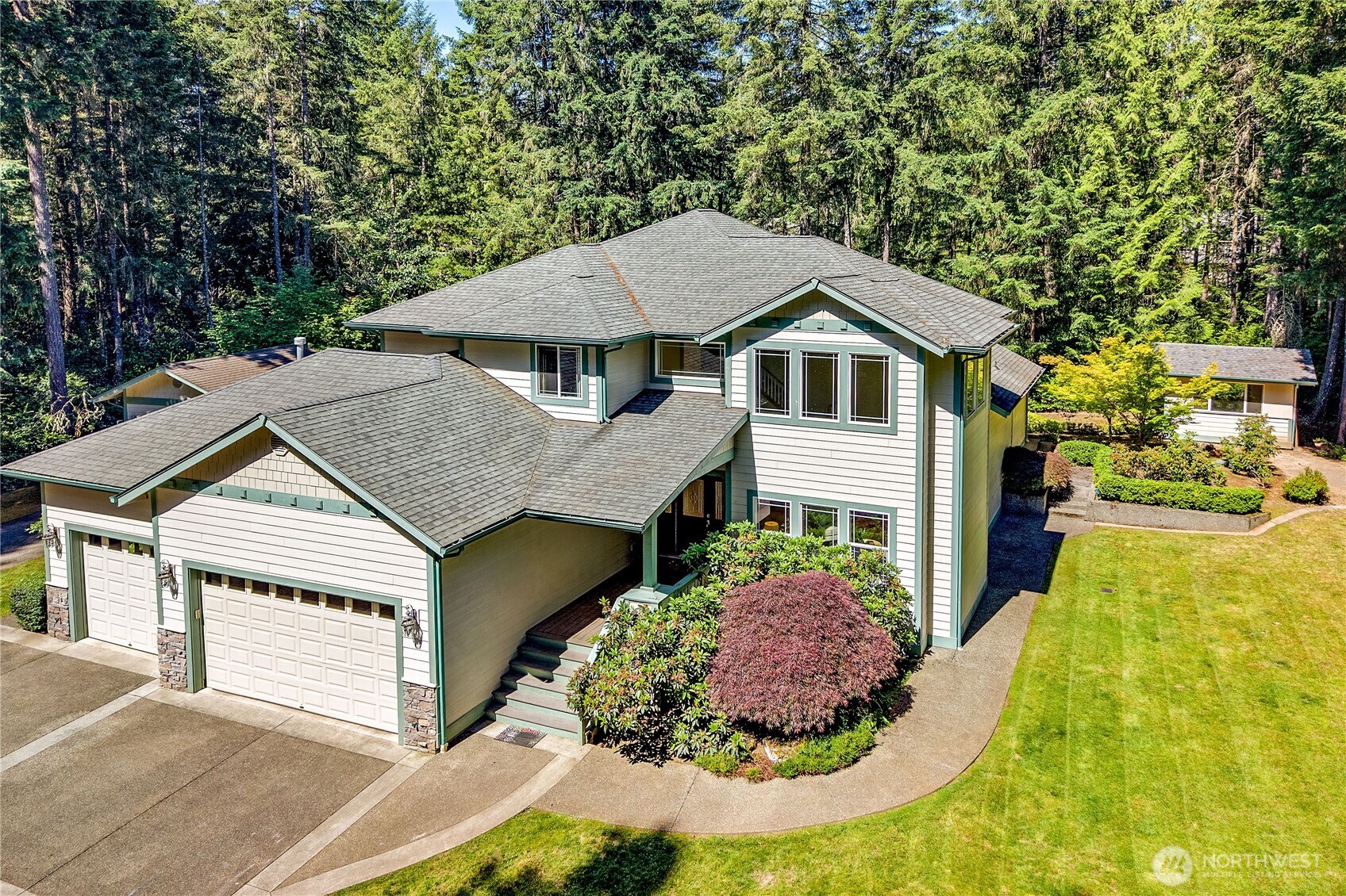 4354 Northwest Westgate Road Silverdale, WA 98383 - Photo 2 of 40 a aerial view of a house with a yard and potted plants