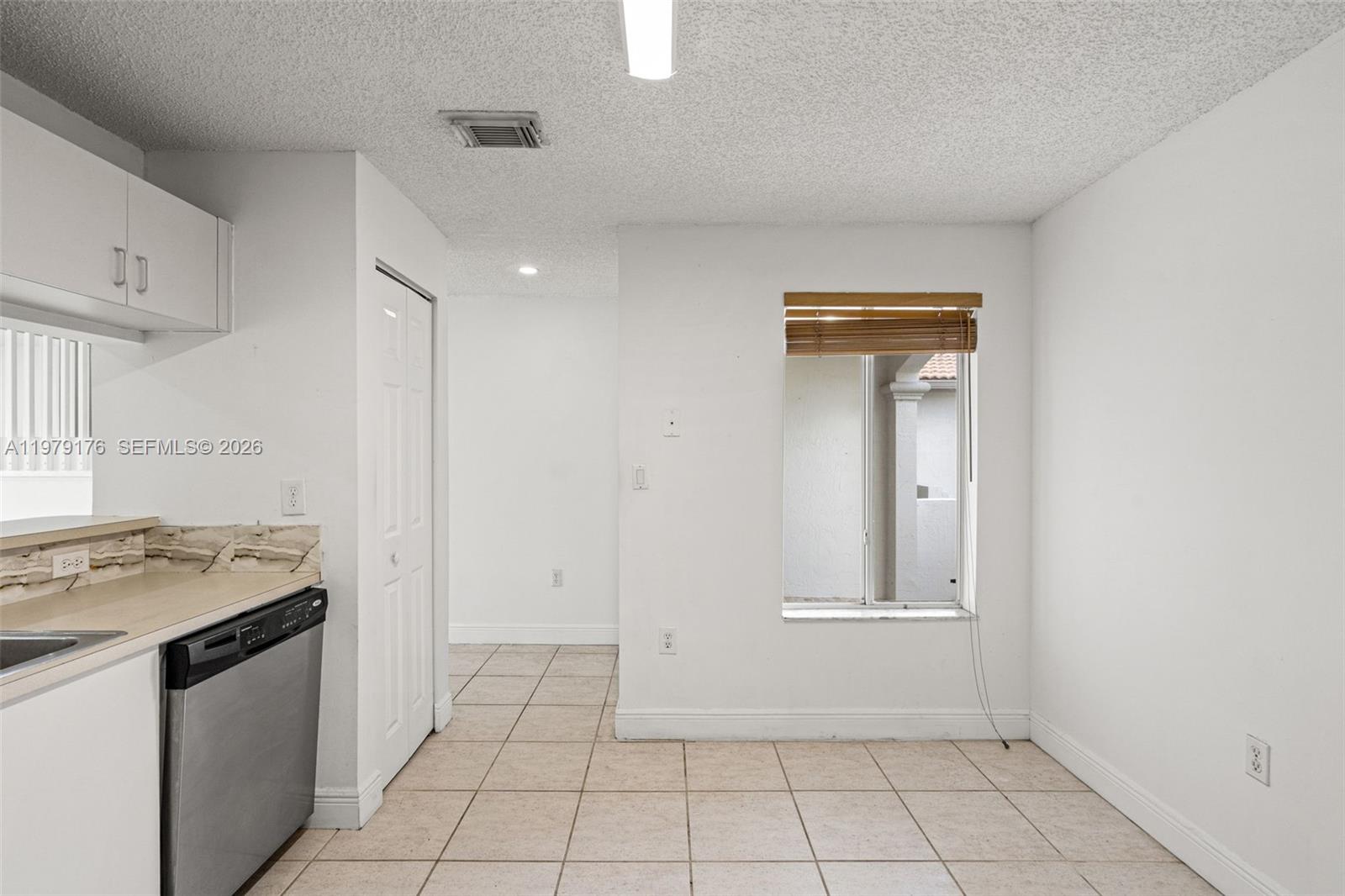 7413 Southwest 162nd Path Miami, FL 33193 - Photo 18 of 44 a view of a kitchen with a sink