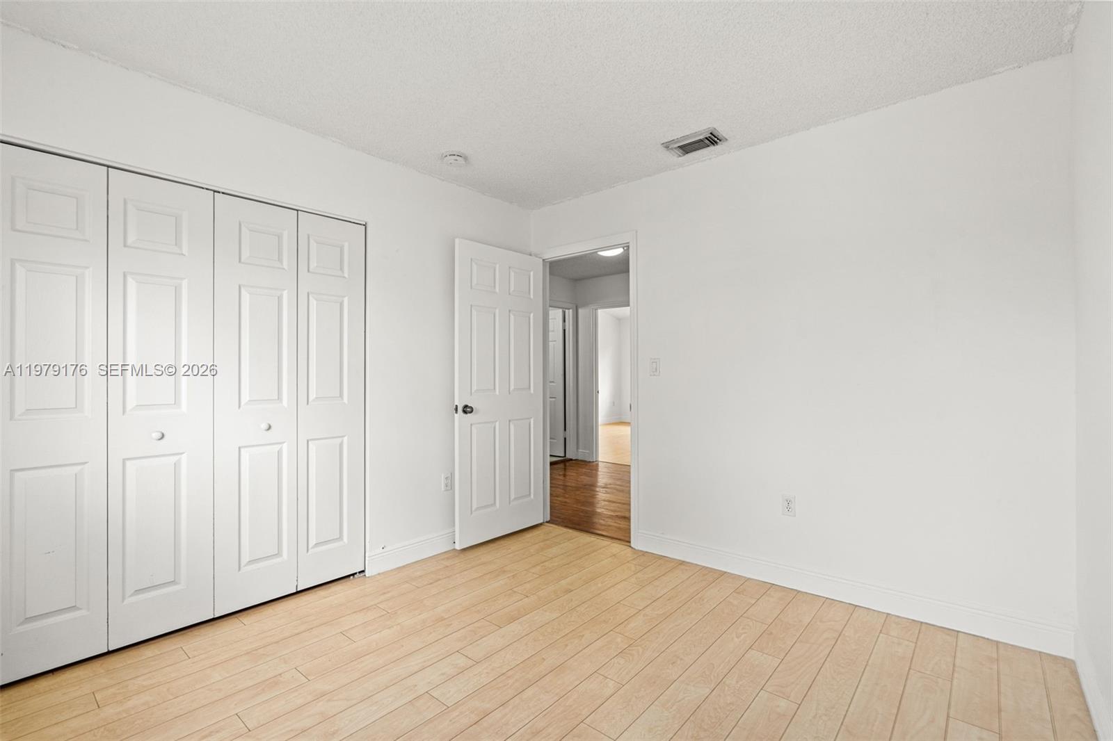 7413 Southwest 162nd Path Miami, FL 33193 - Photo 25 of 44 a view of an empty room