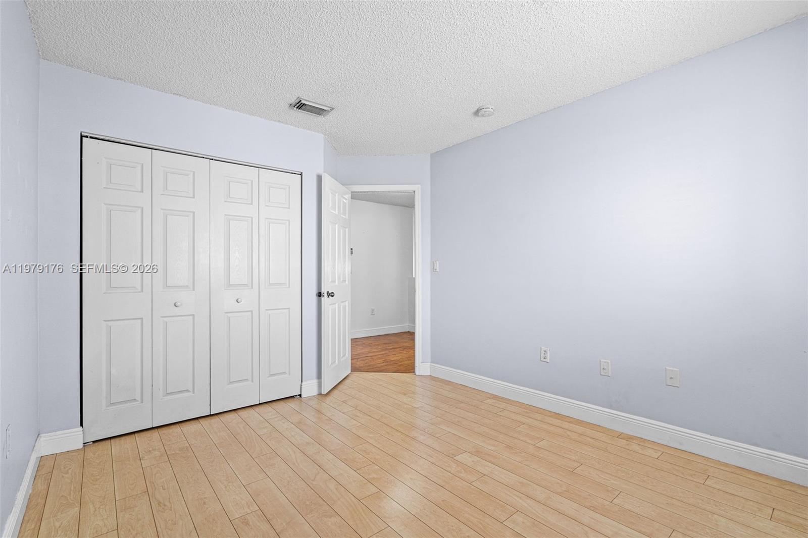 7413 Southwest 162nd Path Miami, FL 33193 - Photo 28 of 44 a view of an empty room