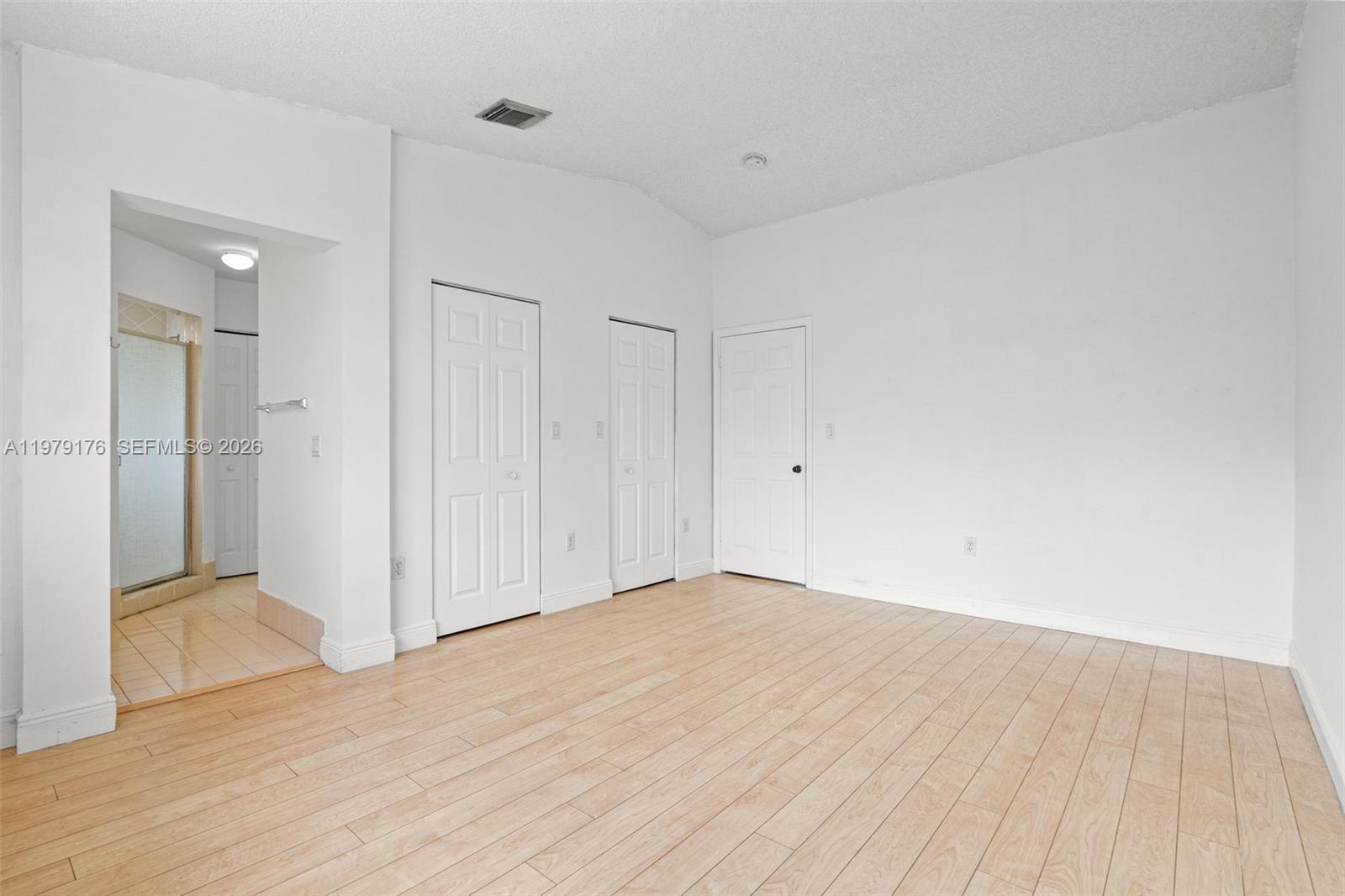 7413 Southwest 162nd Path Miami, FL 33193 - Photo 31 of 44 wooden floor in an empty room