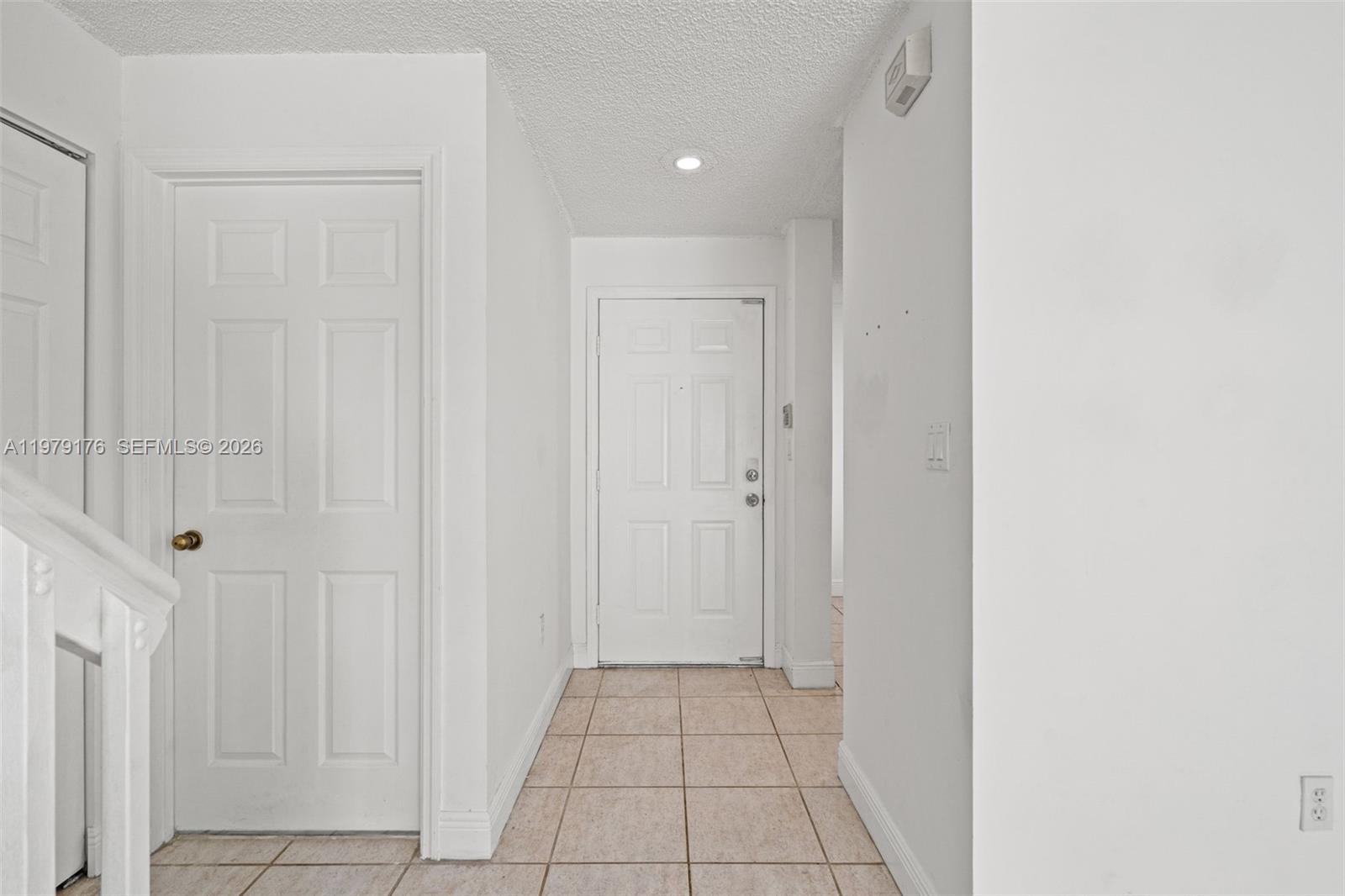 7413 Southwest 162nd Path Miami, FL 33193 - Photo 6 of 44 a view of an empty room