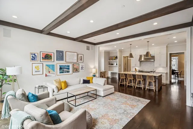 a lobby with furniture and a fireplace
