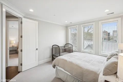 a bathroom with a toilet a sink and shower