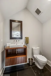 a view of house with outdoor space and wooden floor