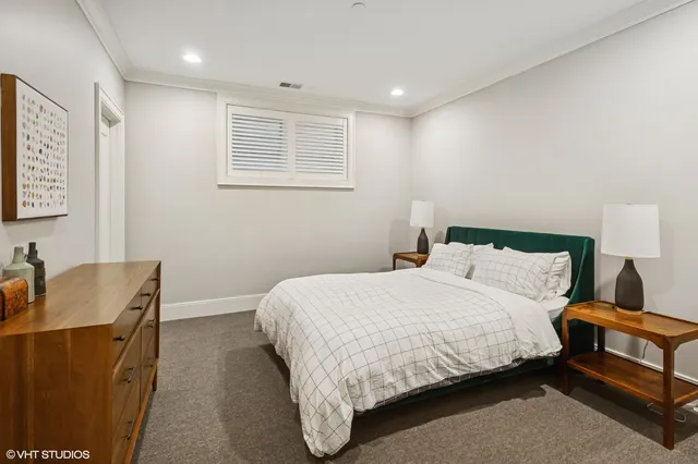 a view of a room with gym equipment and a window