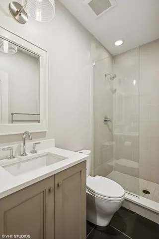 a kitchen with a sink and a refrigerator