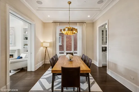 a bathroom with a granite countertop sink toilet and mirror