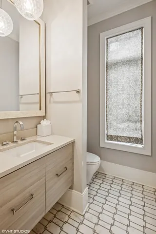a kitchen with stainless steel appliances granite countertop a sink and a wooden floors