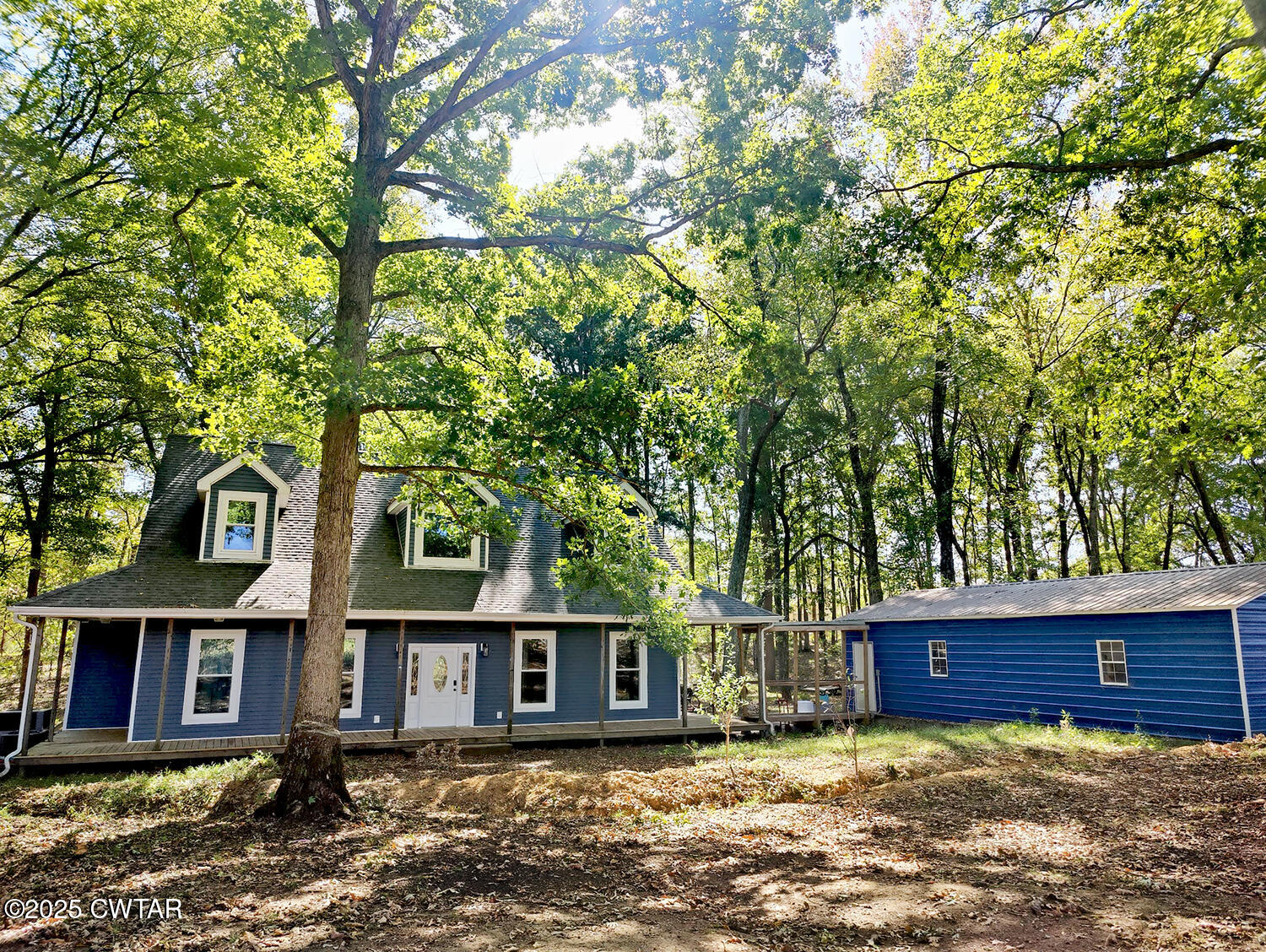 1620 Brooks Road Atwood, TN 38220 - Photo 2 of 33 front view of a house with a yard