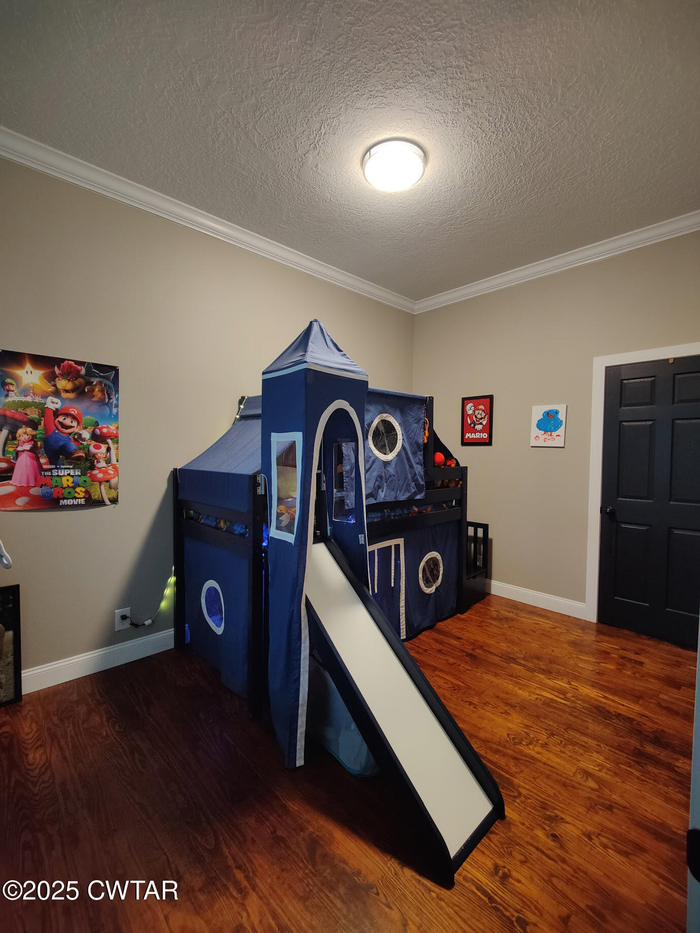 1620 Brooks Road Atwood, TN 38220 - Photo 21 of 33 a living room with furniture flat screen tv and a table