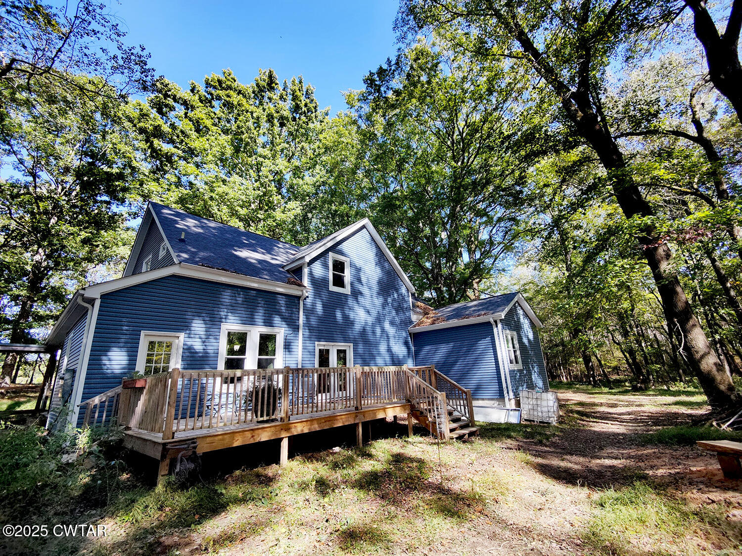 1620 Brooks Road Atwood, TN 38220 - Photo 4 of 33 a front view of a house with a yard