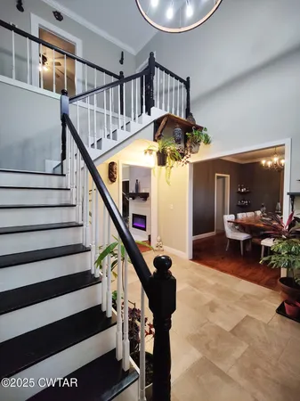 a view of entryway dining room and hall