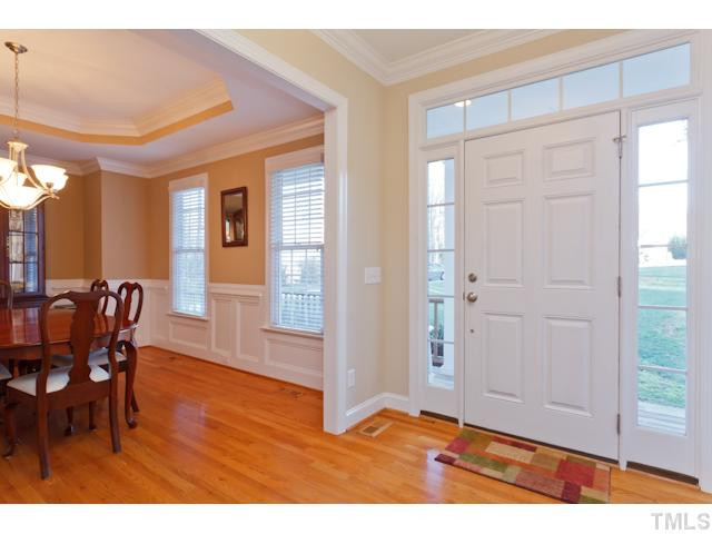 7613 Double E Court Raleigh, NC 27613 - Photo 2 of 23 Spacious Foyer Entry to Welcome Friends and Family into your lovely home! Glowing Hardwoods, Crown Molding, & Easy Access to your Private Office & Dining Room. Foyer
