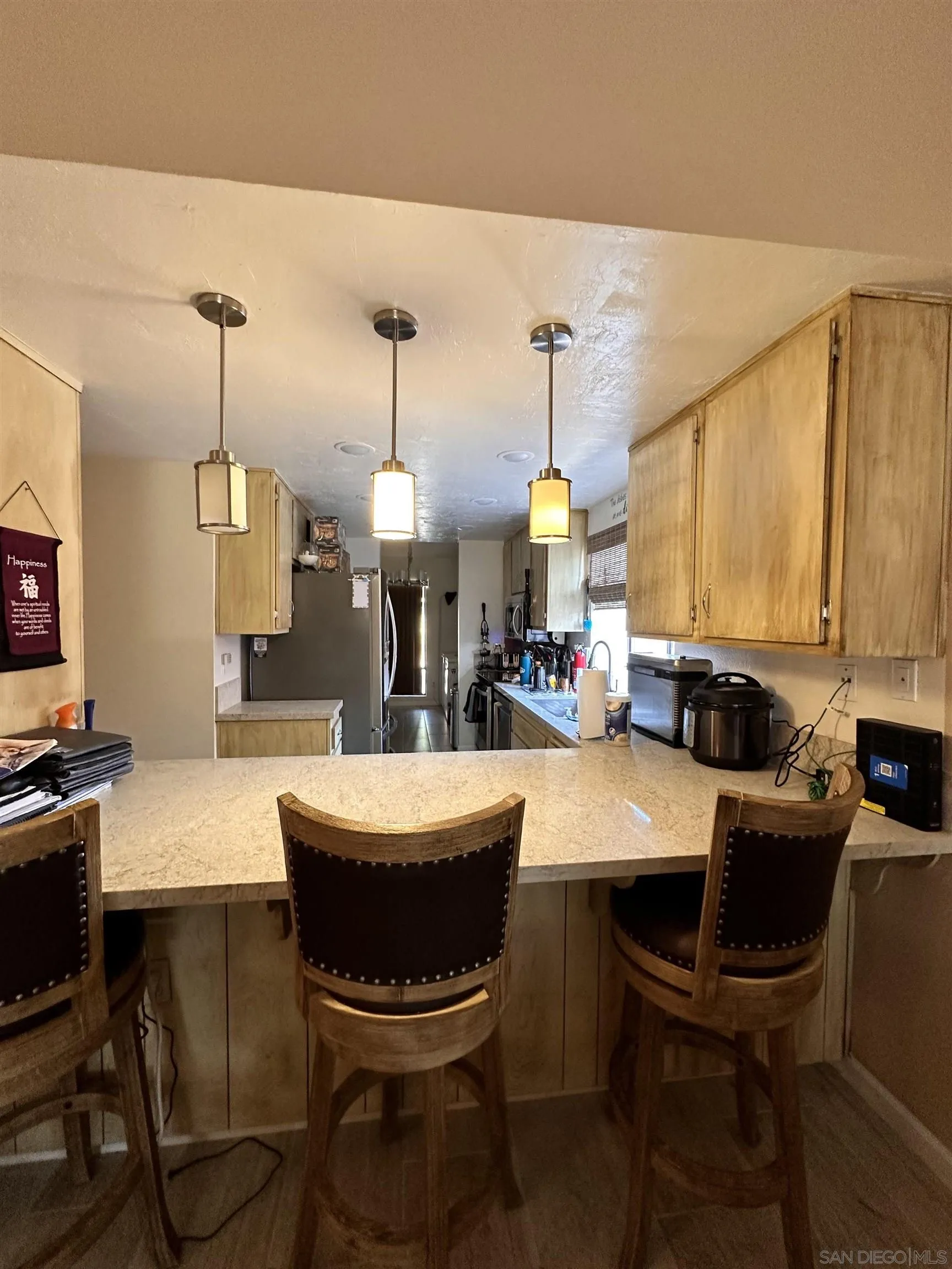 9627 Ramsgate Way Santee, CA 92071 - Photo 4 of 21 a view of a dining room with furniture