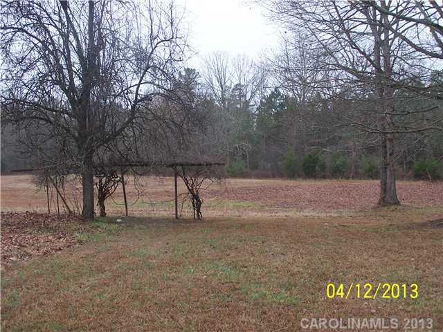 2119 Lathan Road Monroe, NC 28112 - Photo 14 of 16 a view of backyard with green space
