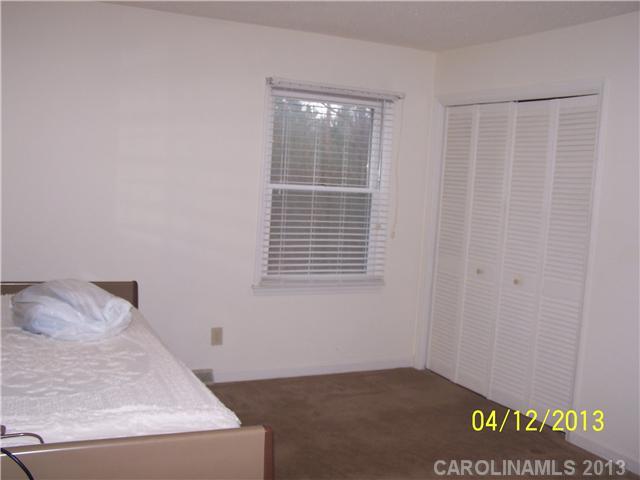 2119 Lathan Road Monroe, NC 28112 - Photo 10 of 16 a view of a room that has a window and a rug