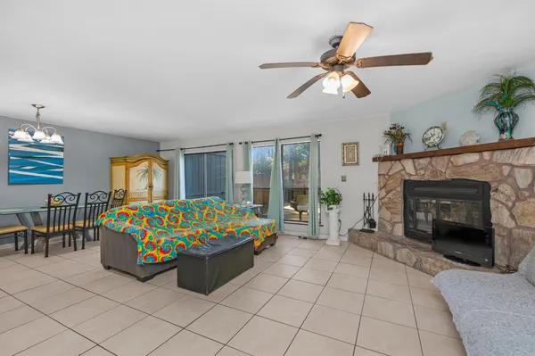 a bedroom with a bed and a fireplace