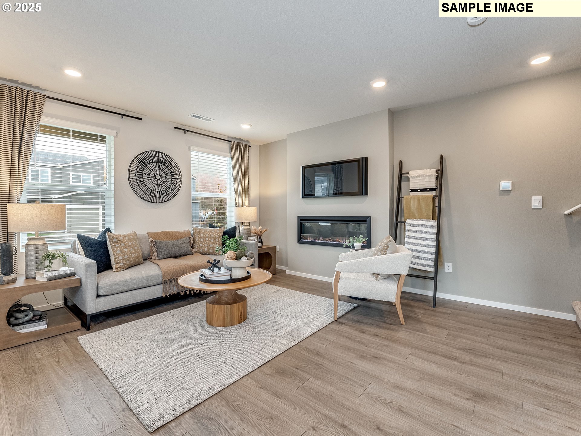 1102 Southeast 194th Place Camas, WA 98607 - Photo 10 of 24 a living room with furniture and a fireplace