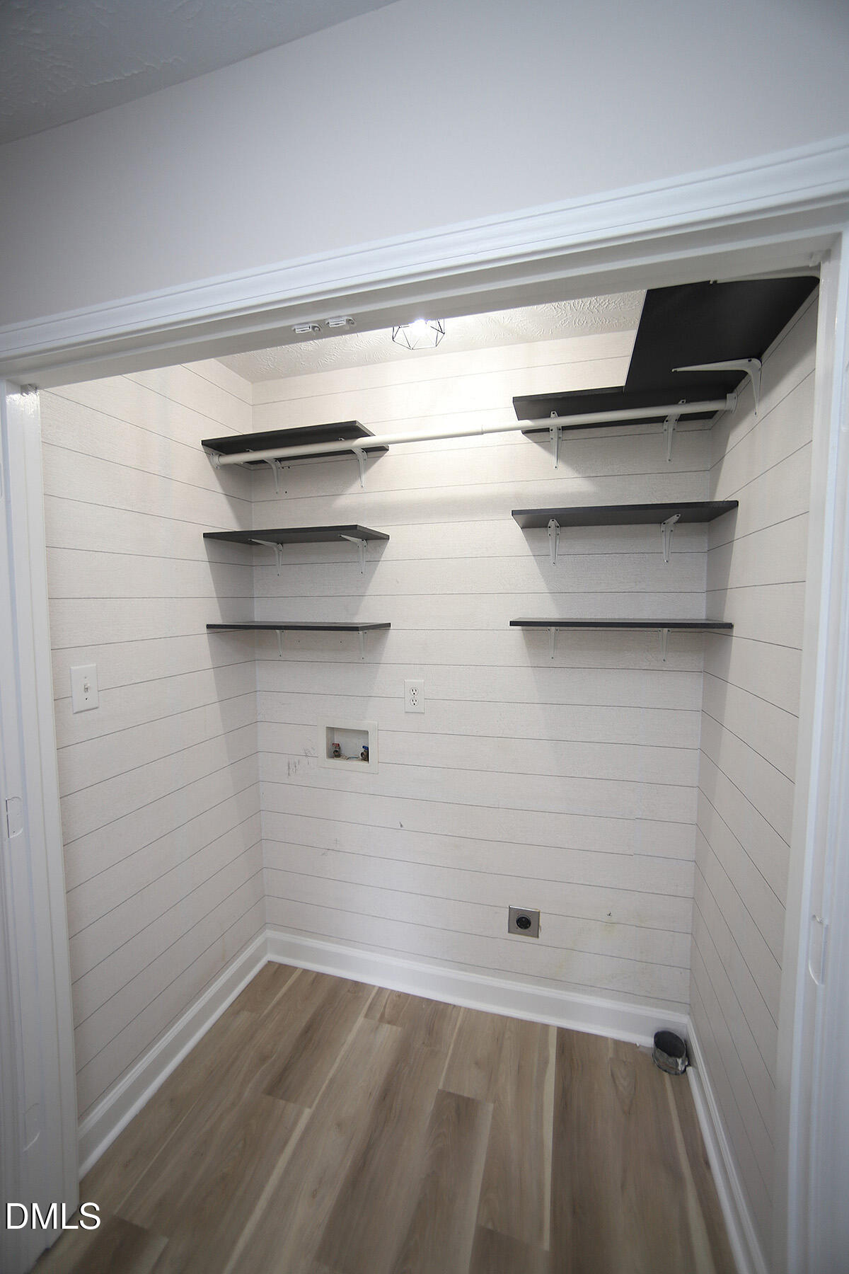 879 O B J Road Dunn, NC 28334 - Photo 21 of 23 a view of a room with rack on the wall