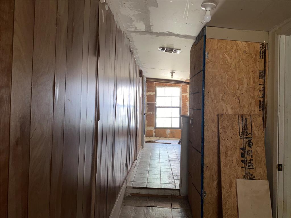 811 West 12th Street, Unit 815 Bonham, TX 75418 - Photo 11 of 23 a view of entryway with wooden floor
