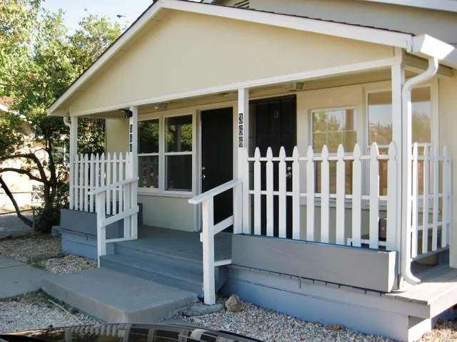 a view of porch with a bench