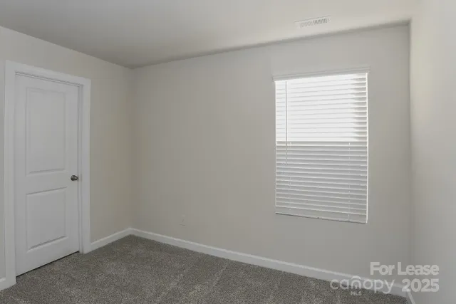 a view of a small space with a window