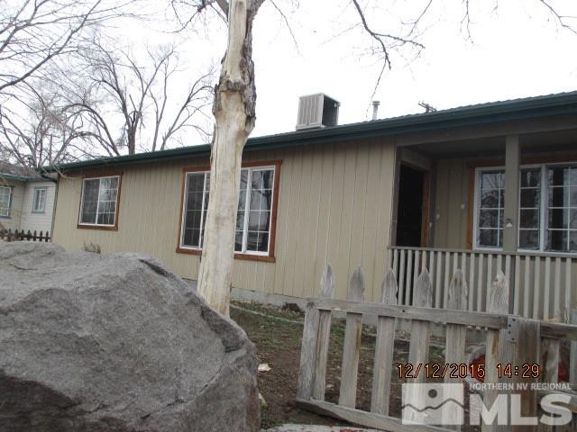 1931 Wilder Street Reno, NV 89512 - Photo 1 of 1 a view of a house with a large window and wooden fence