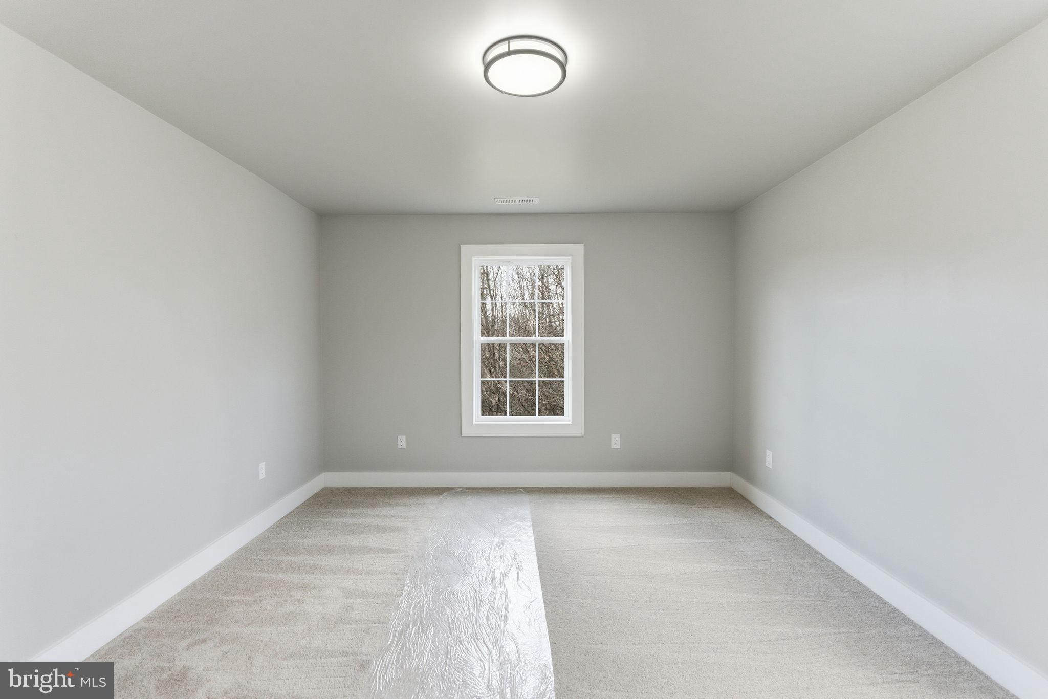14 Anderson Court Berkeley Springs, WV 25411 - Photo 14 of 52 an empty room with a window