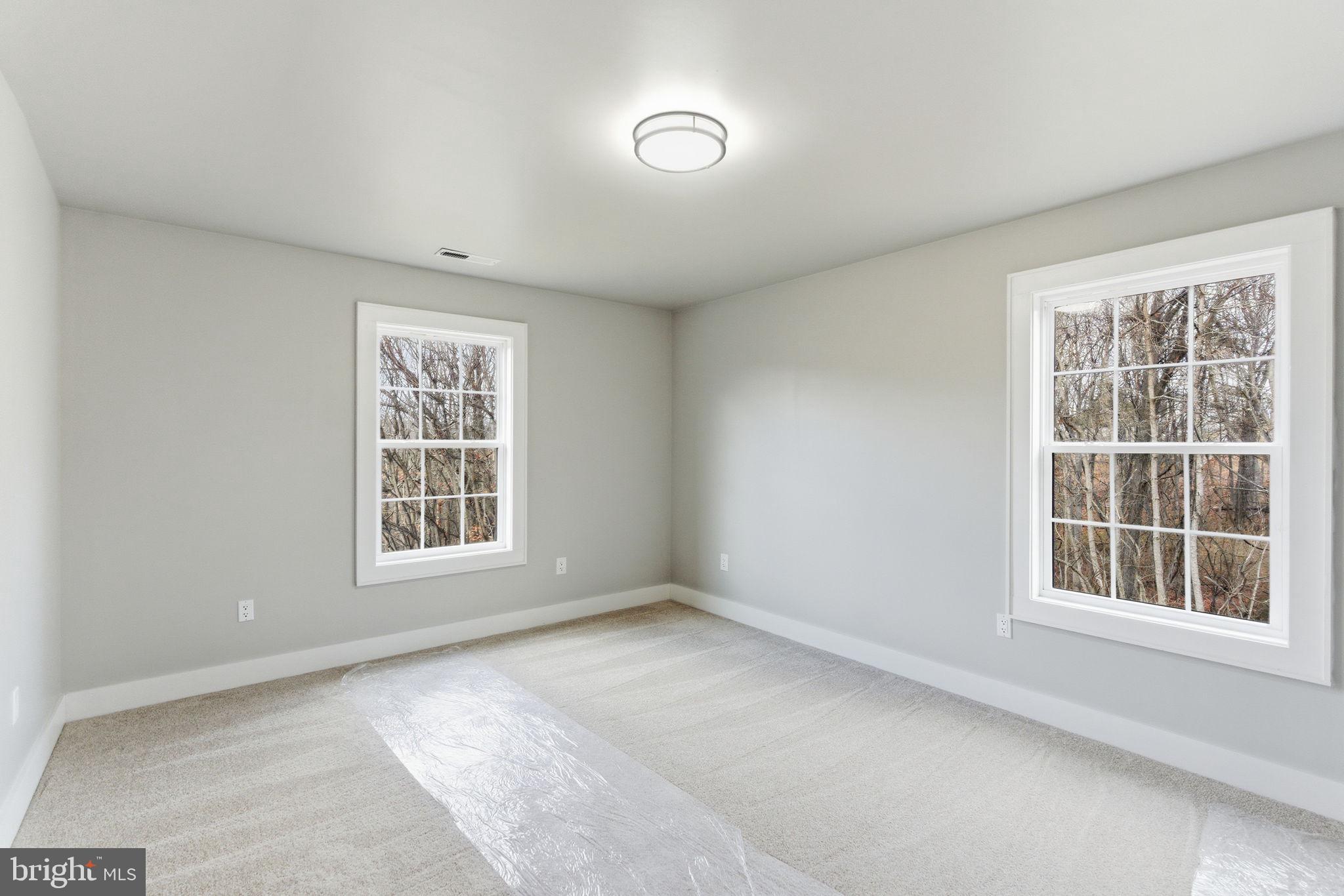 14 Anderson Court Berkeley Springs, WV 25411 - Photo 15 of 52 an empty room with a window