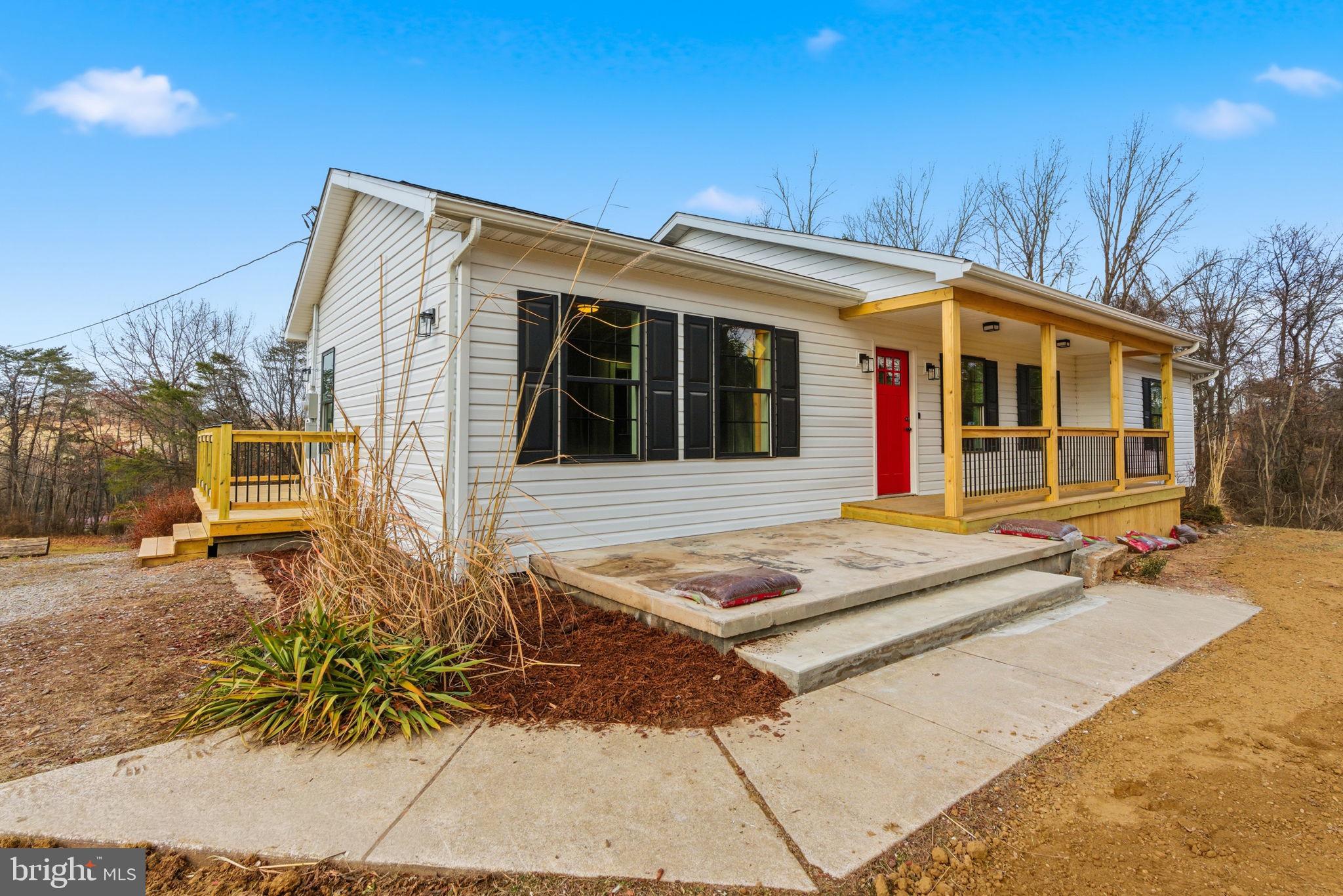 14 Anderson Court Berkeley Springs, WV 25411 - Photo 2 of 52 front view of a house with a patio