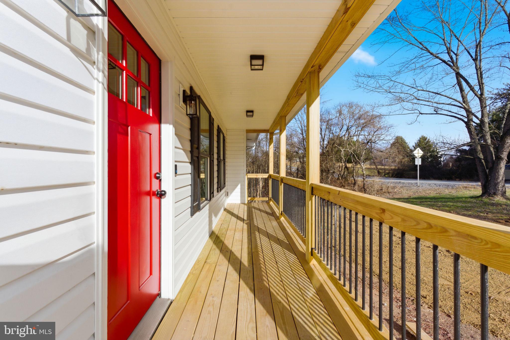 14 Anderson Court Berkeley Springs, WV 25411 - Photo 32 of 52 a view of balcony with wooden floor and bench