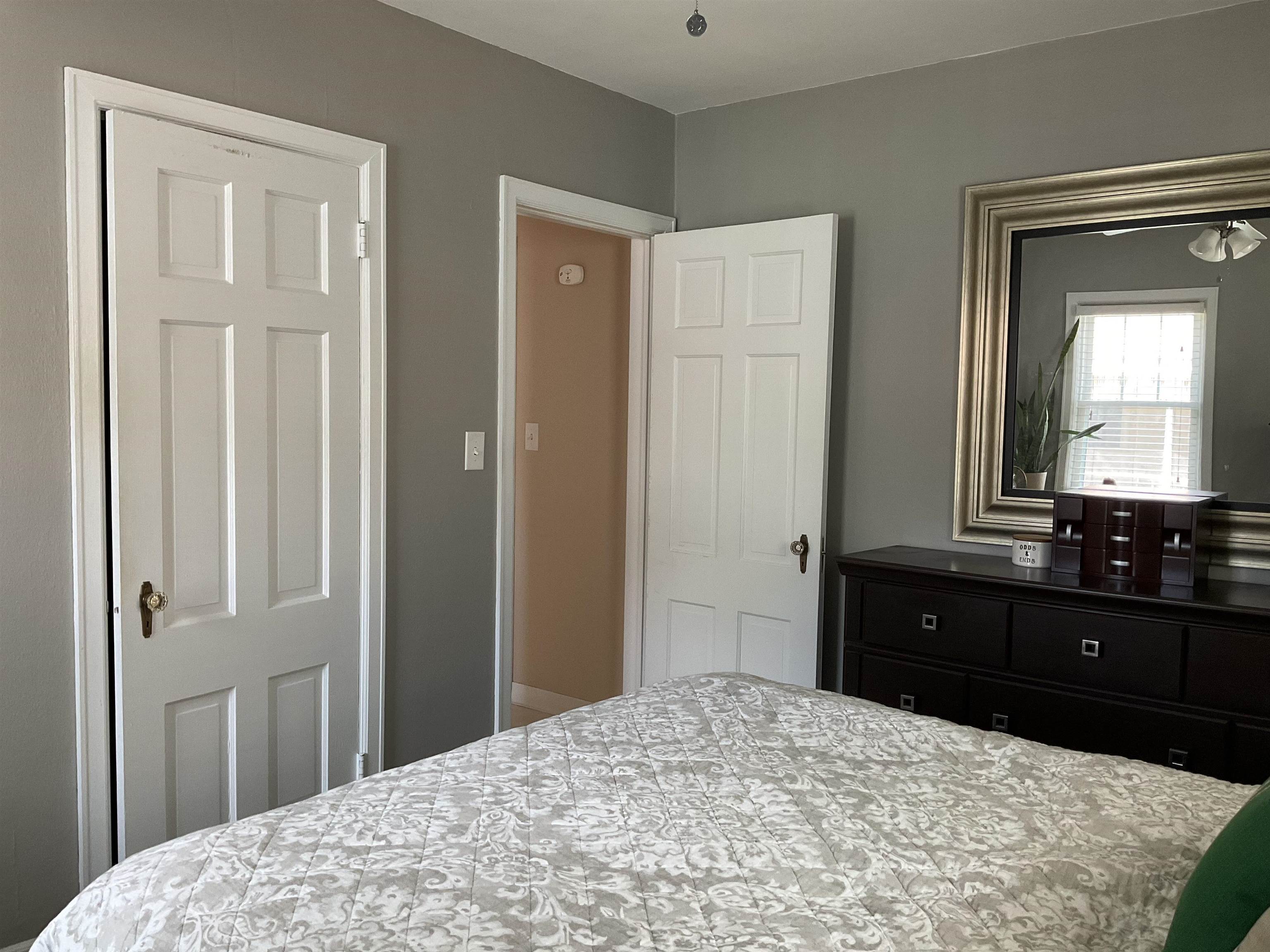 3330 California Road Rockford, IL 61108 - Photo 14 of 29 a bedroom with a bed and a dresser