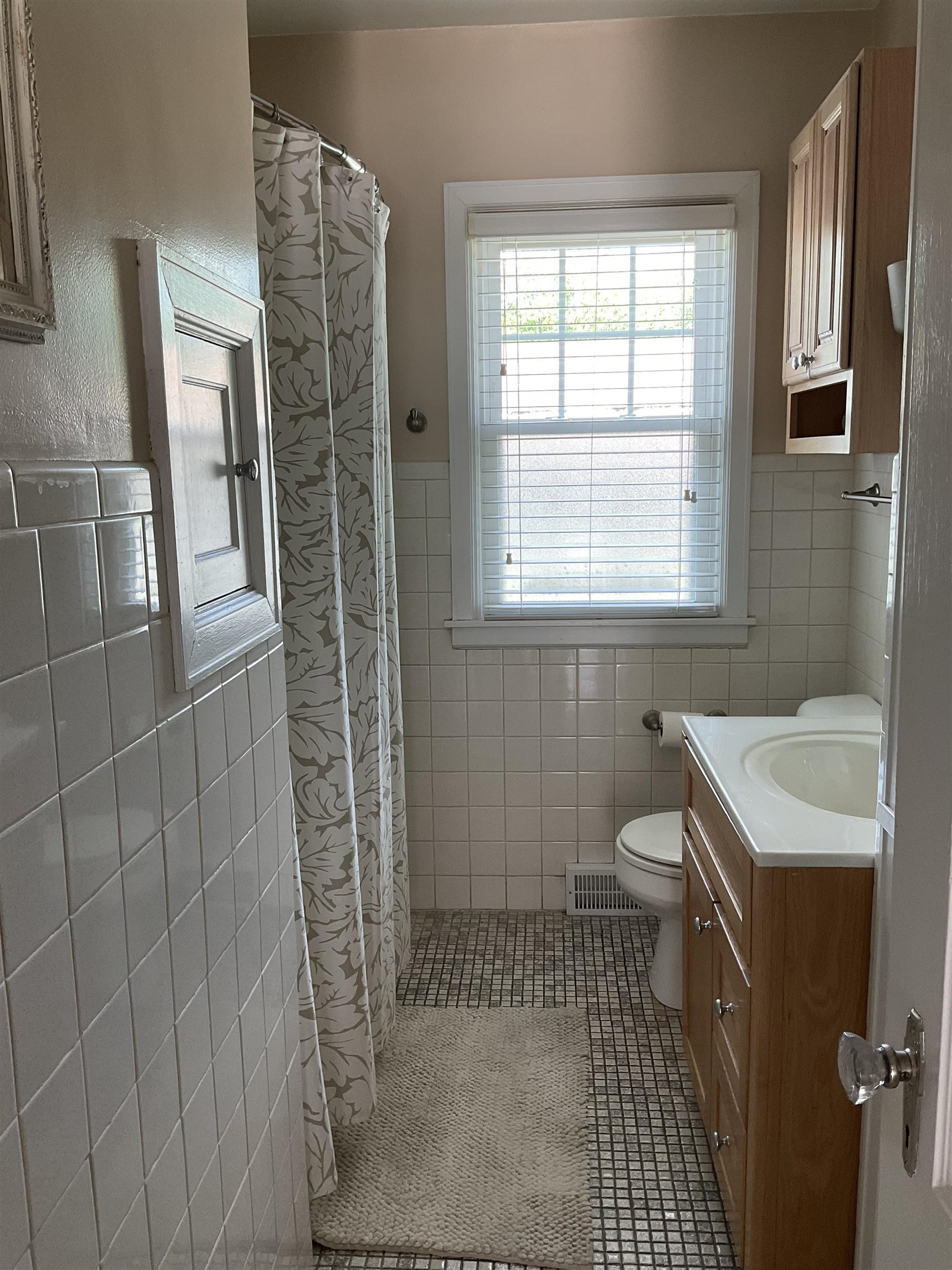 3330 California Road Rockford, IL 61108 - Photo 15 of 29 a bathroom with a sink toilet and shower
