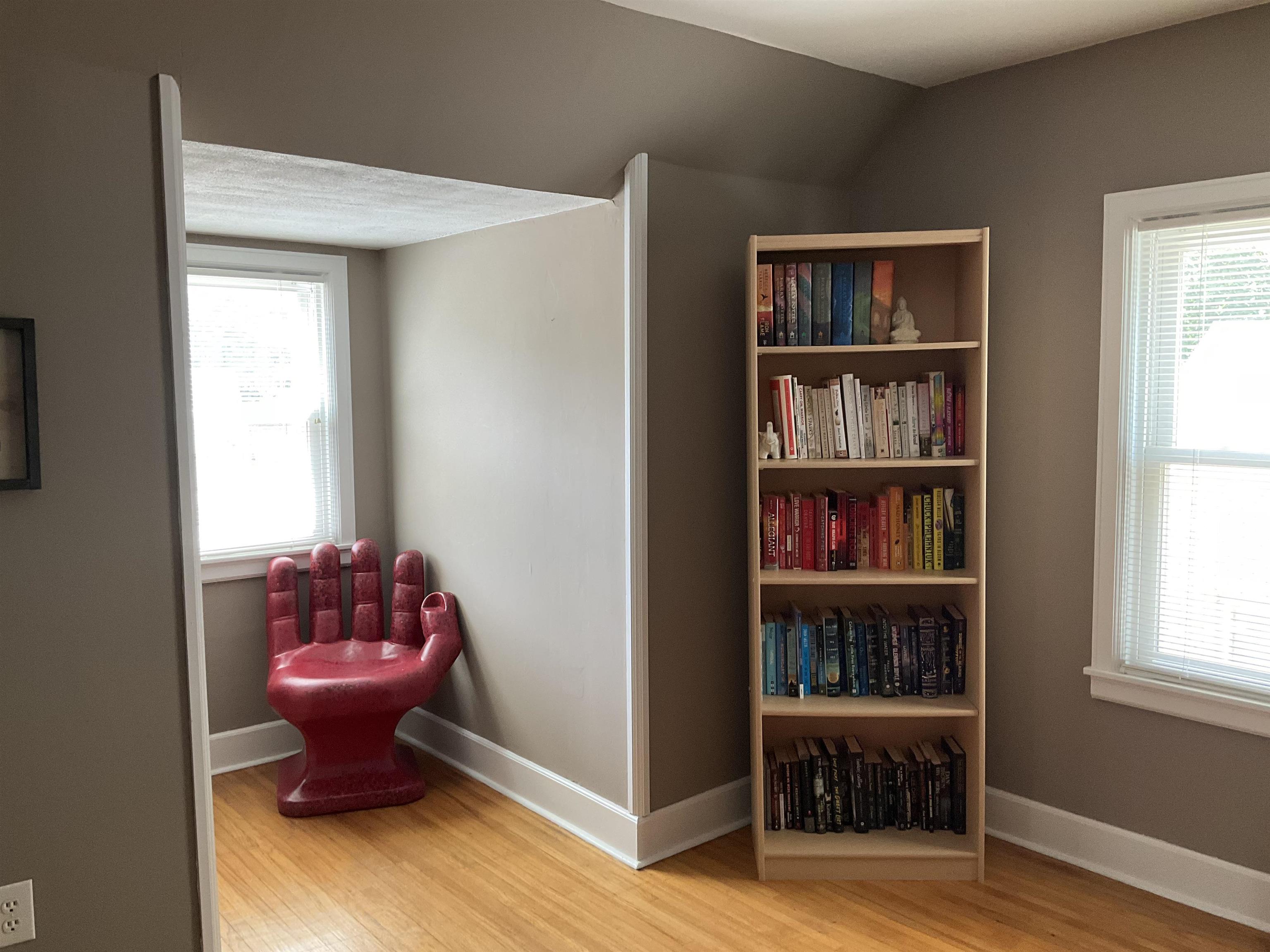 3330 California Road Rockford, IL 61108 - Photo 20 of 29 a bath room with a book shelf and a window