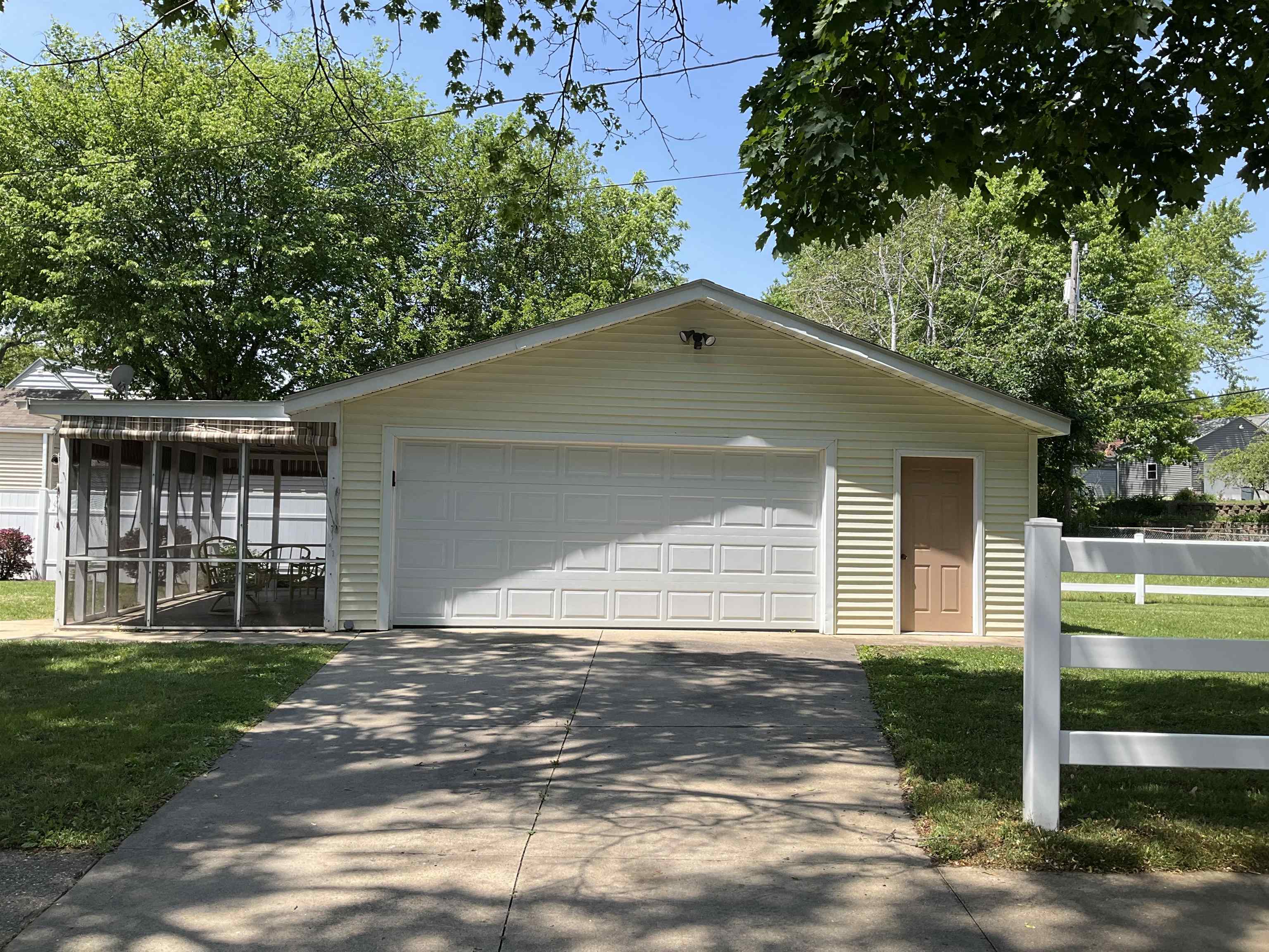 3330 California Road Rockford, IL 61108 - Photo 26 of 29 a front view of a house with a yard
