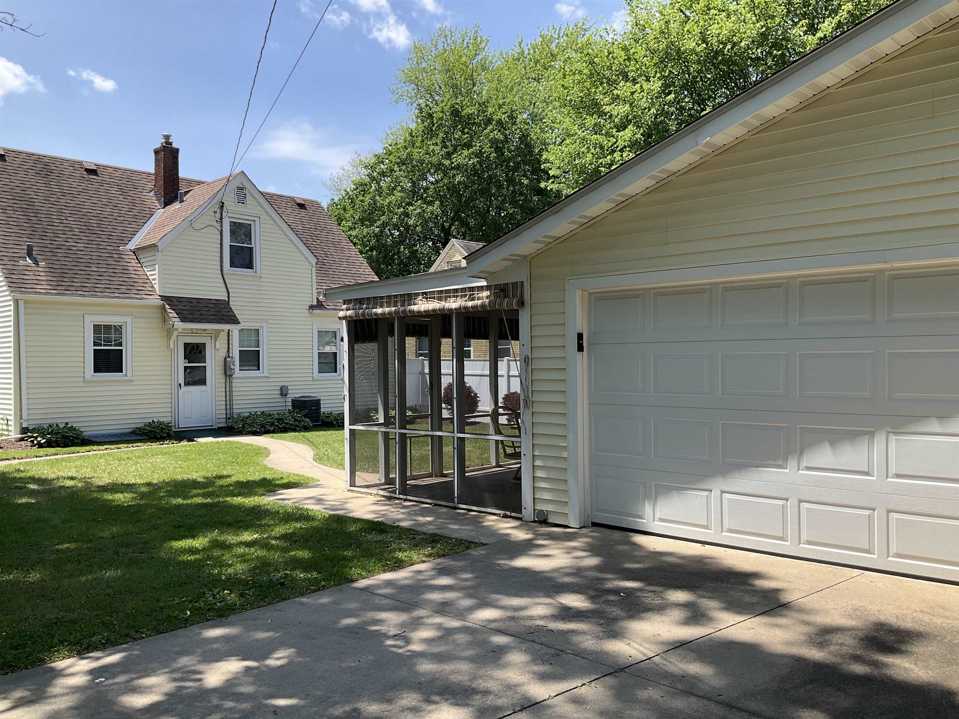 3330 California Road Rockford, IL 61108 - Photo 27 of 29 a view of a house with a yard and porch