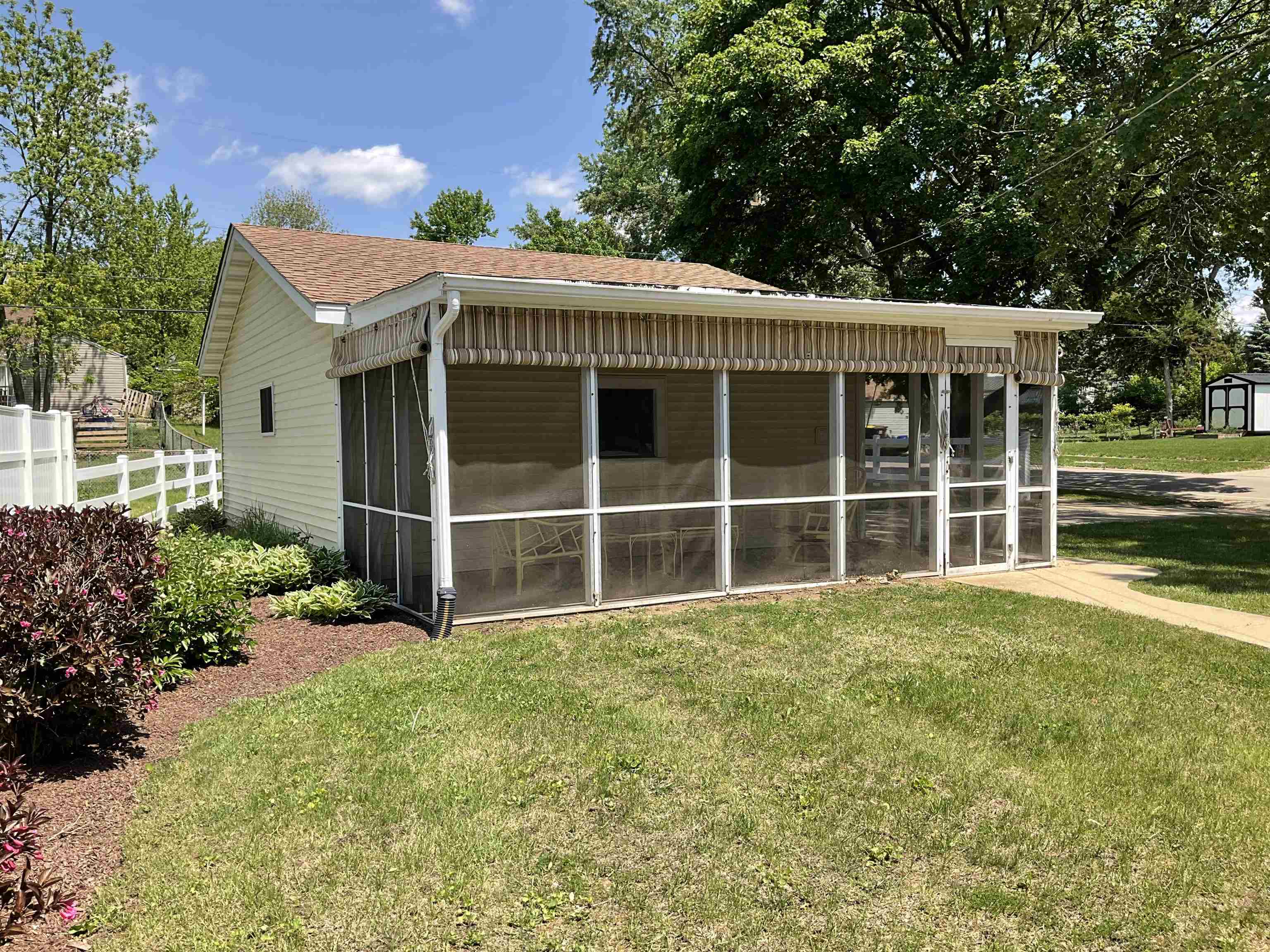 3330 California Road Rockford, IL 61108 - Photo 28 of 29 a view of a house with a garden