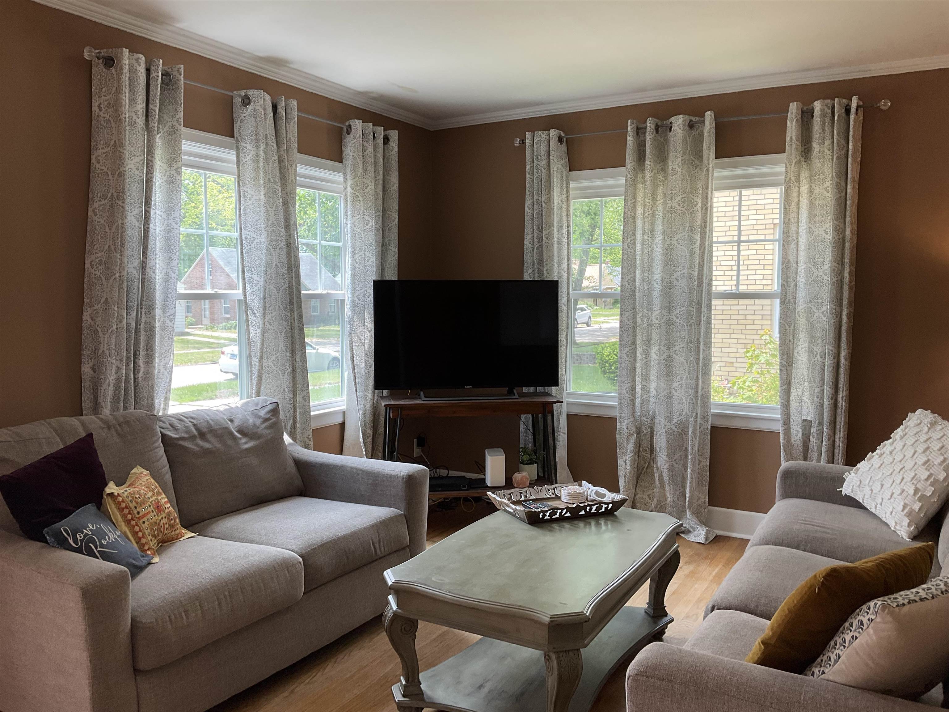 3330 California Road Rockford, IL 61108 - Photo 4 of 29 a living room with furniture and a flat screen tv