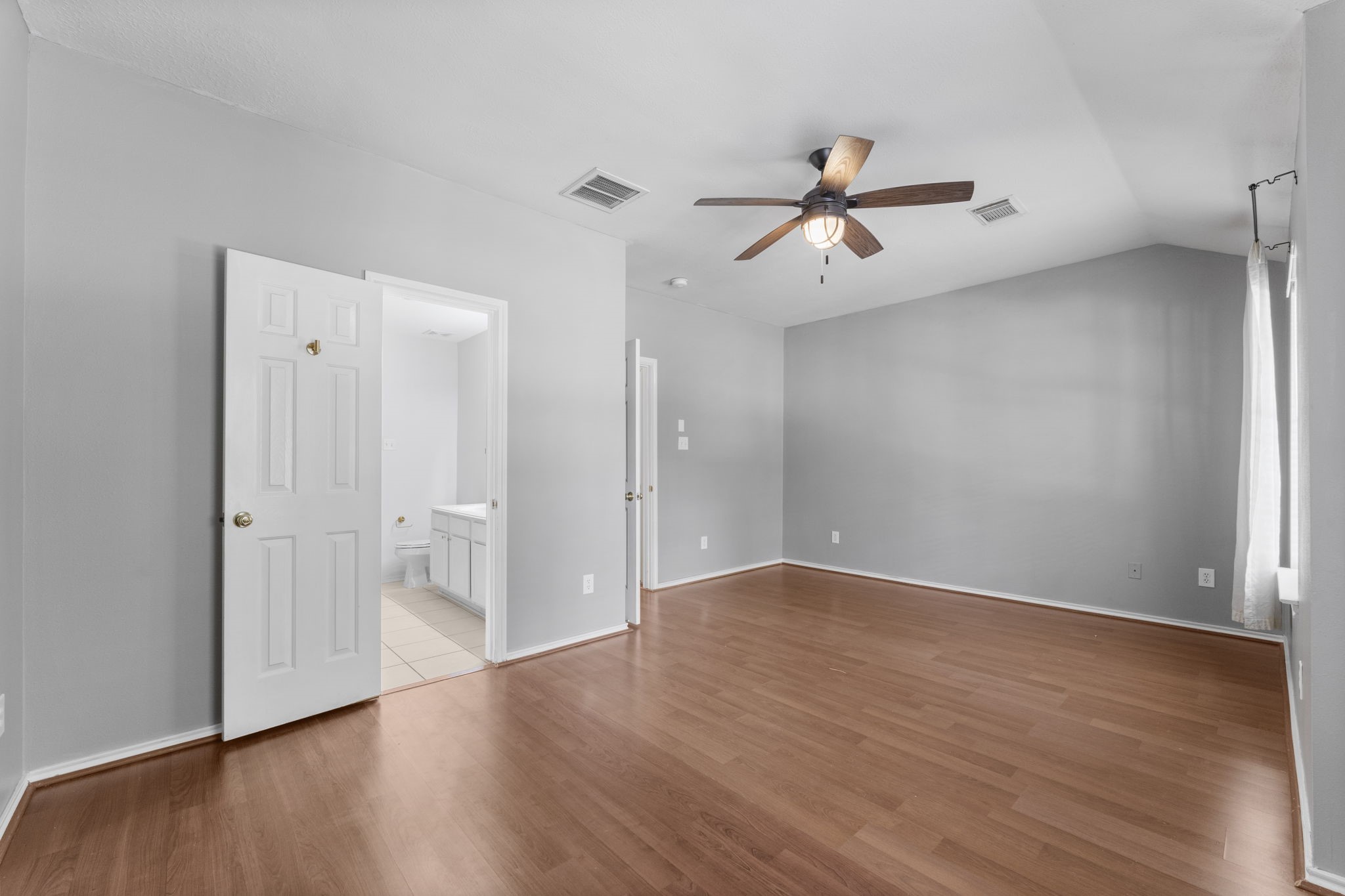 15 Timberstar Street Spring, TX 77382 - Photo 14 of 21 an empty room with wooden floor and windows